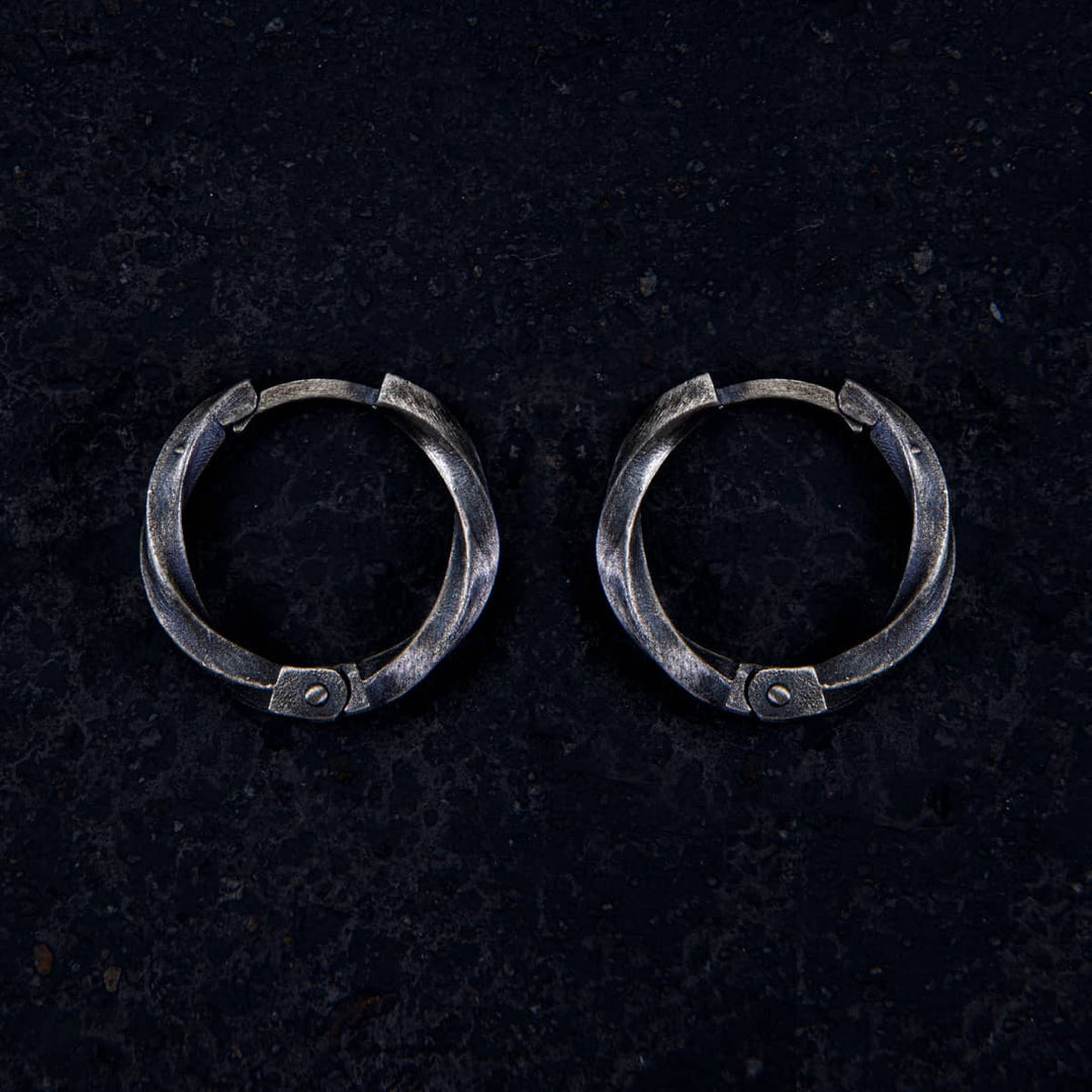 Twist of Eternity Hoop Earring