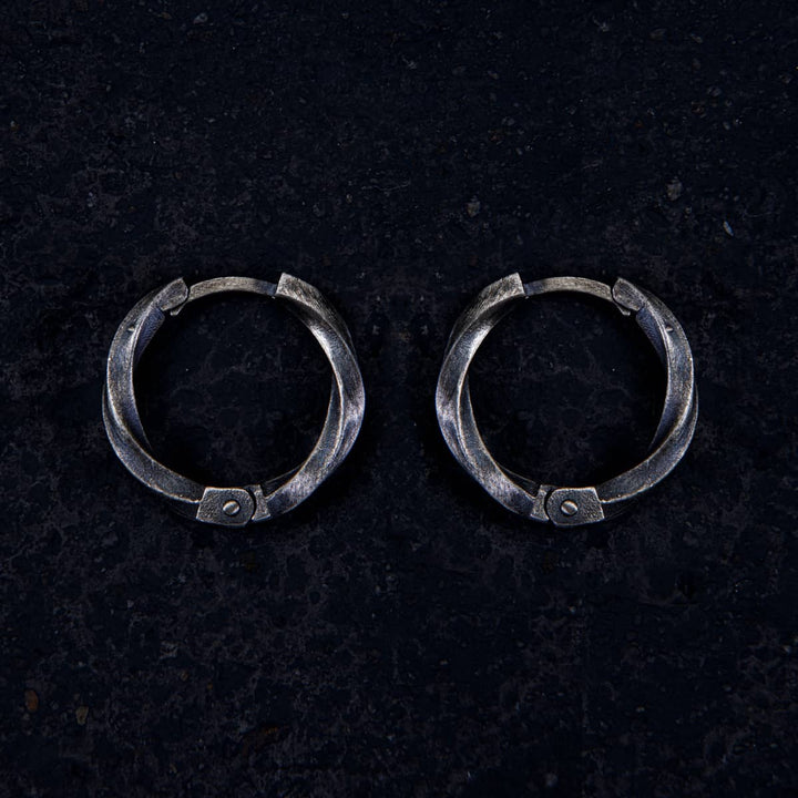 Twist of Eternity Hoop Earring