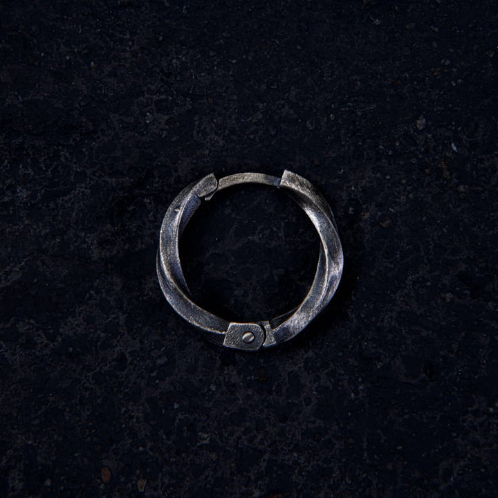 Twist of Eternity Hoop Earring