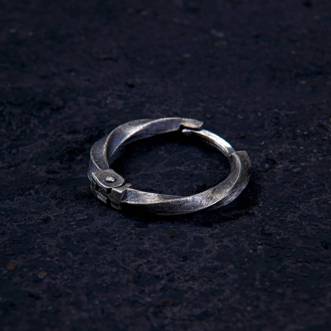 Twist of Eternity Hoop Earring