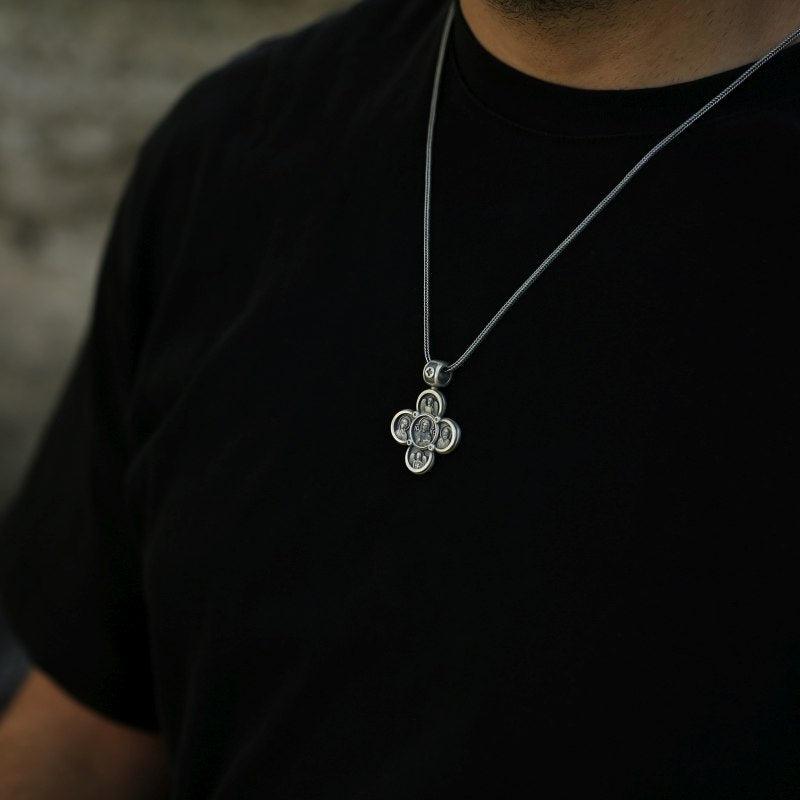 Four-Way Cross Necklace on the neck