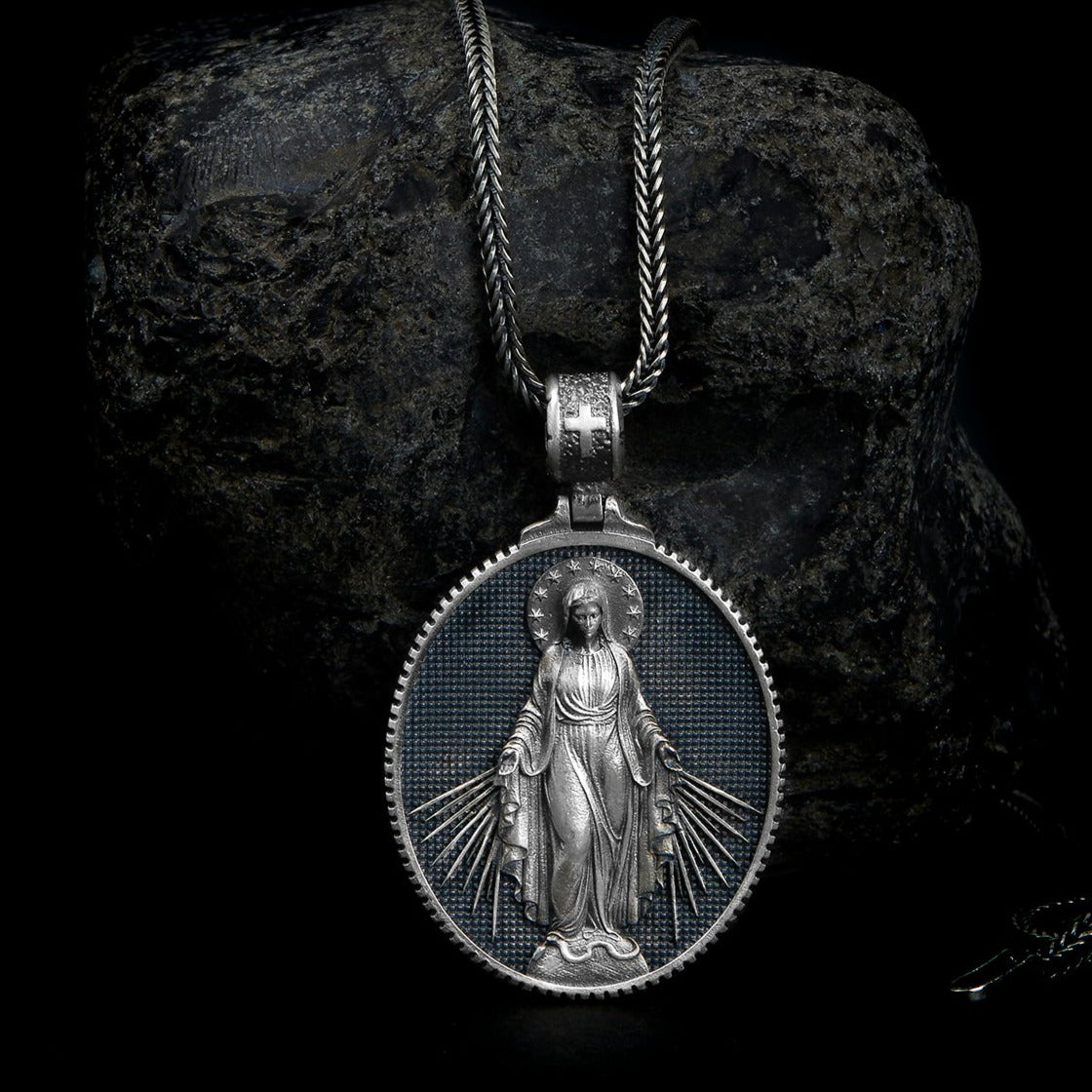handmade sterling silver necklace featuring a detailed full-length engraving of Mother Mary, symbolizing faith and divine love