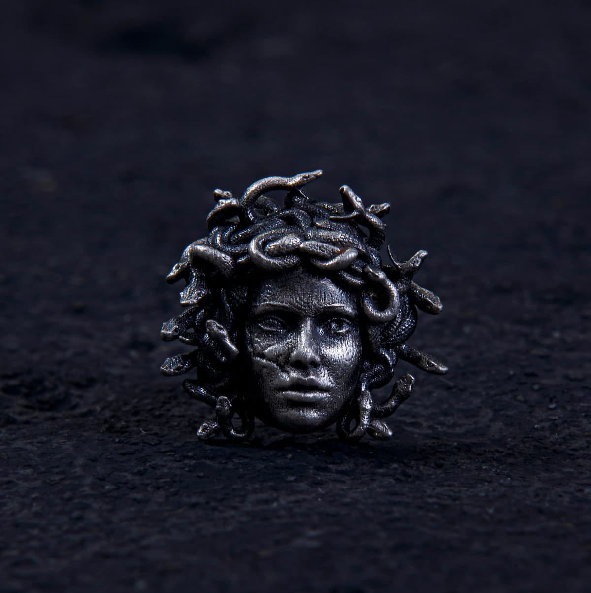 Unleash ancient power with the Gordon Medusa Earring. 