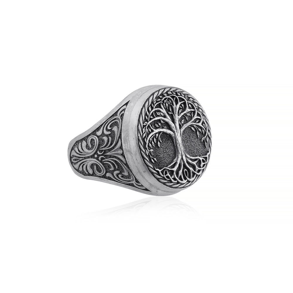 Detailed sterling silver men's ring showcasing the intricate Yggdrasil, the Tree of Life from Norse mythology, representing interconnectedness and the universe's vast expanse.