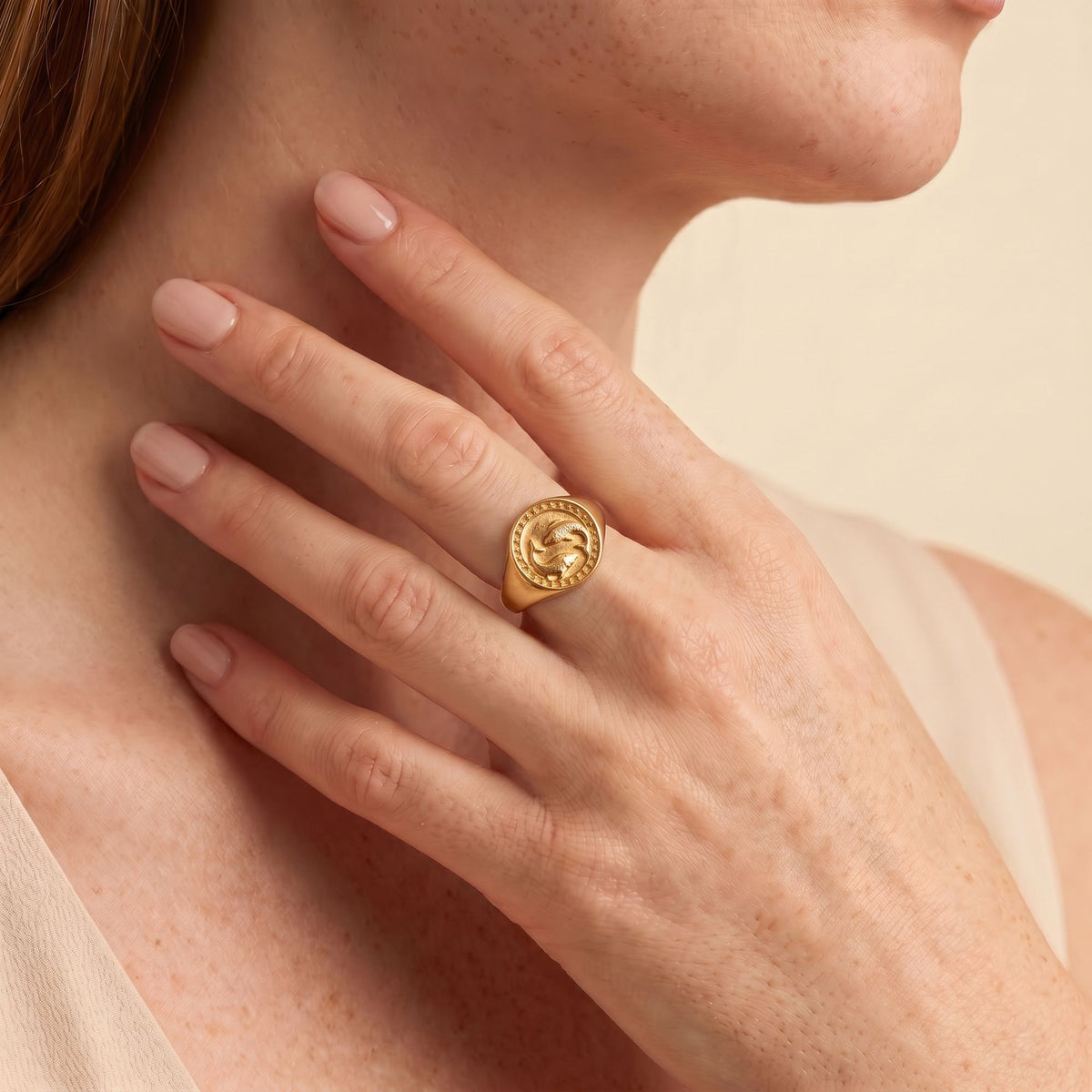Pisces Zodiac Ring on model — gold plated