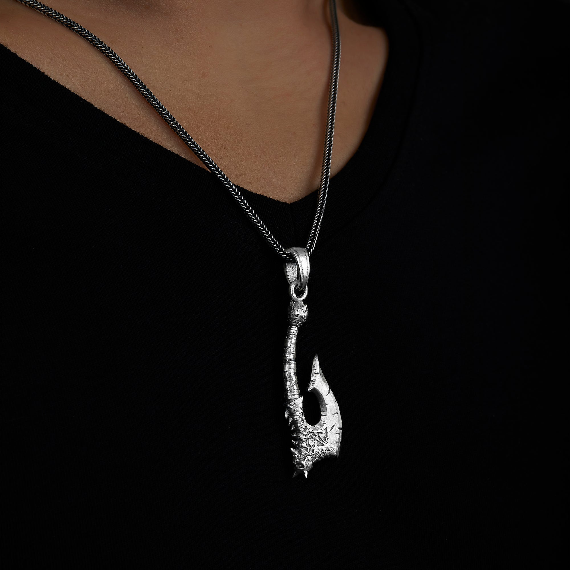 handmade sterling silver Battle Axe Necklace on the neck preview