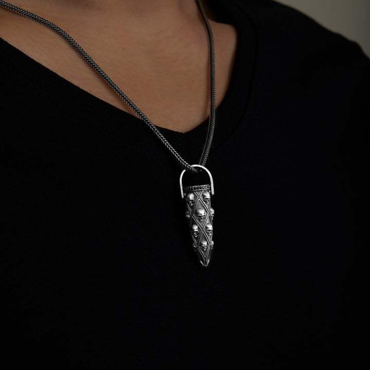 handmade sterling silver Bullet Skull Necklace on the neck preview