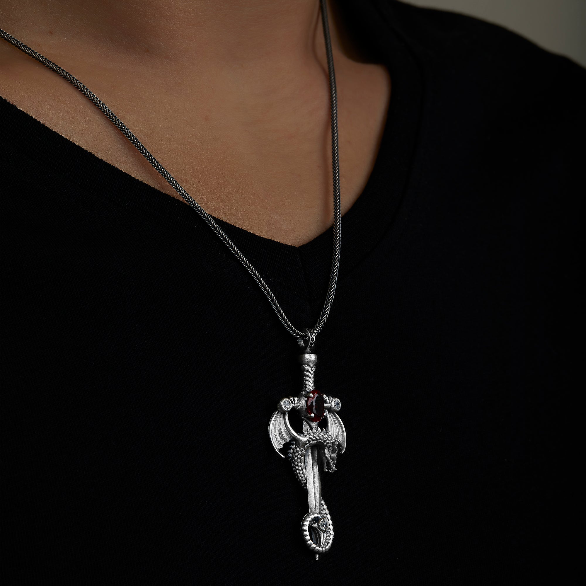 handmade sterling silver Dragon Sword Necklace on the neck preview