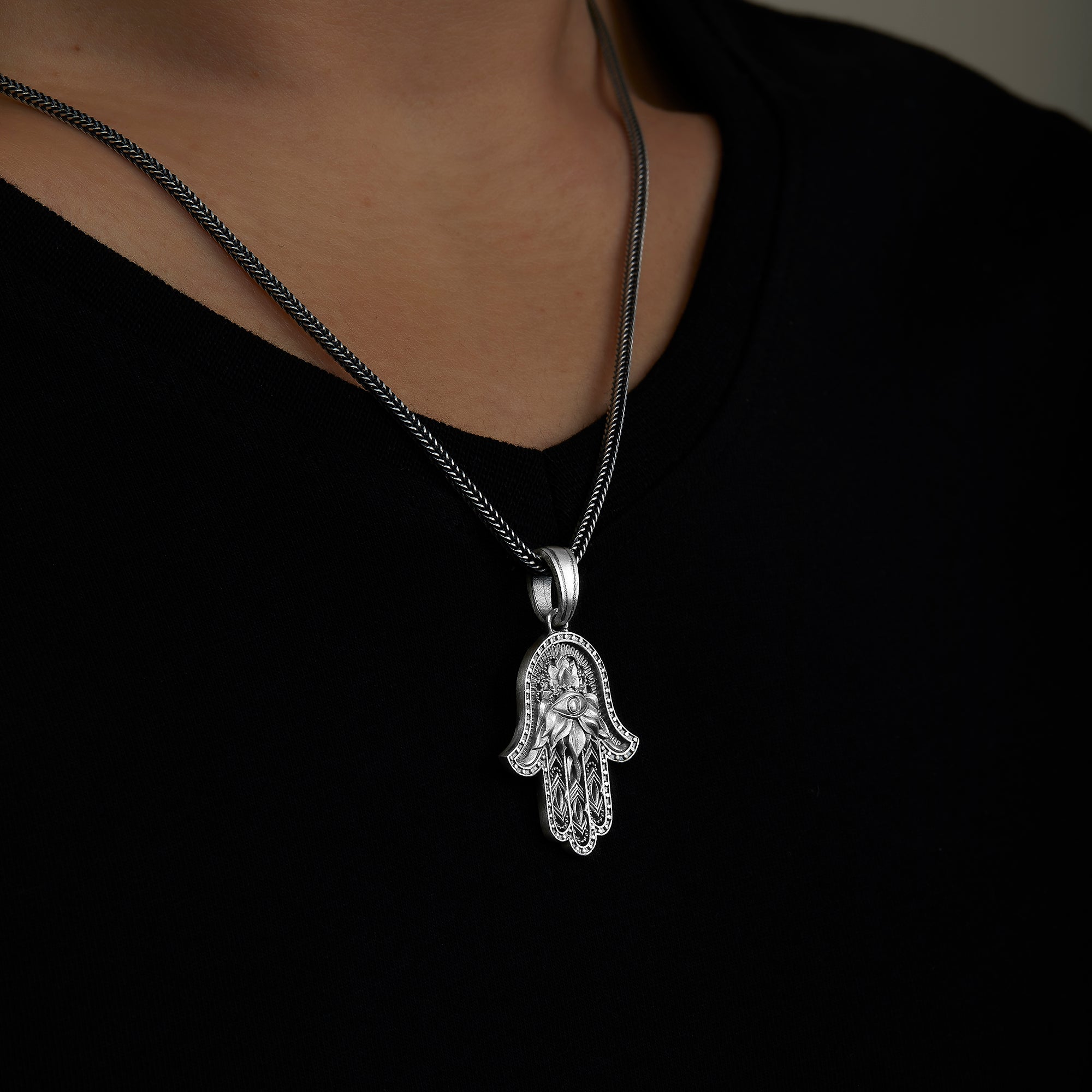handmade sterling silver Hamsa Eye Necklace on the neck preview