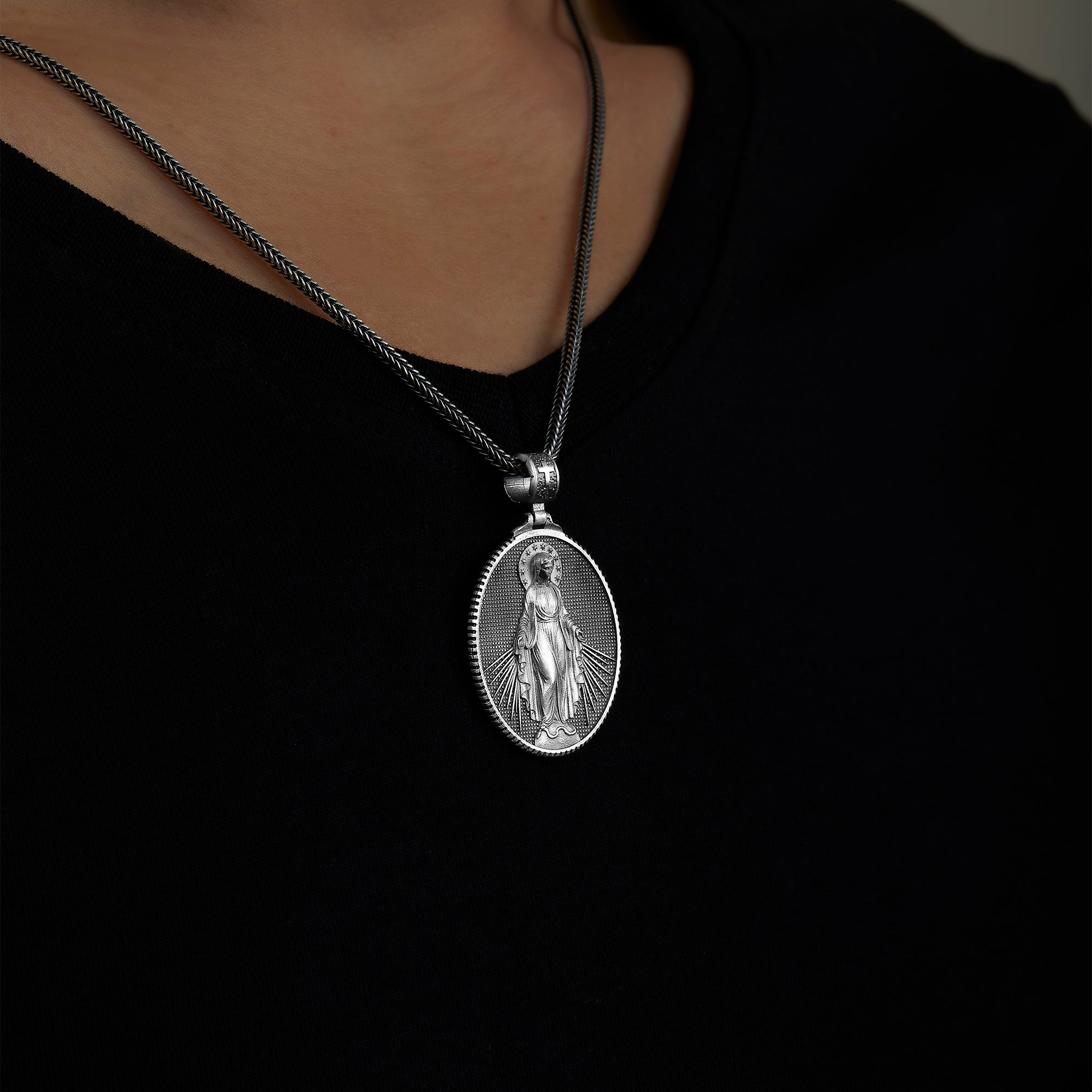 handmade sterling silver Holy Mother Cross Necklace on the neck preview