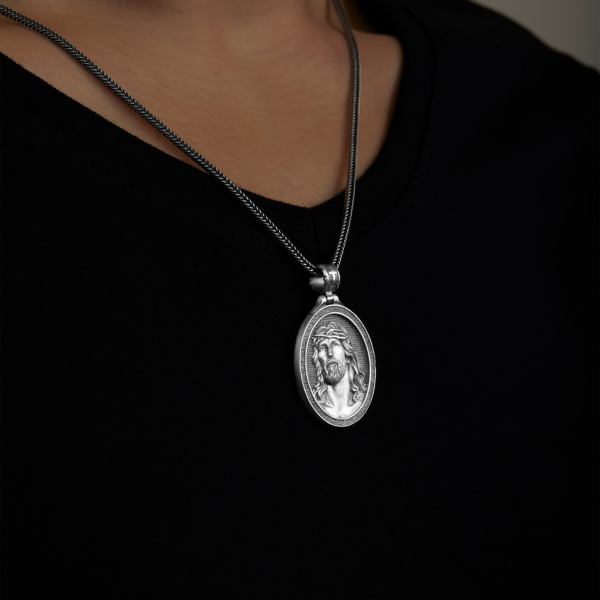 handmade sterling silver Jesus Head Necklace on the neck preview