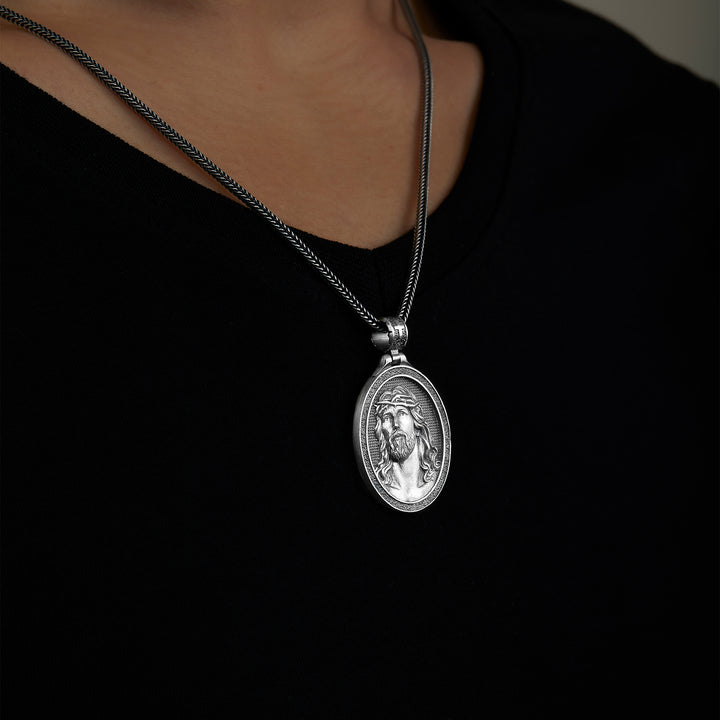 handmade sterling silver Jesus Head Necklace on the neck preview