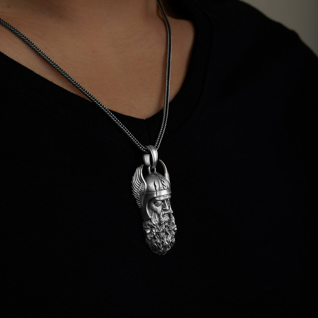 handmade sterling silver Odin Head Necklace on the neck preview