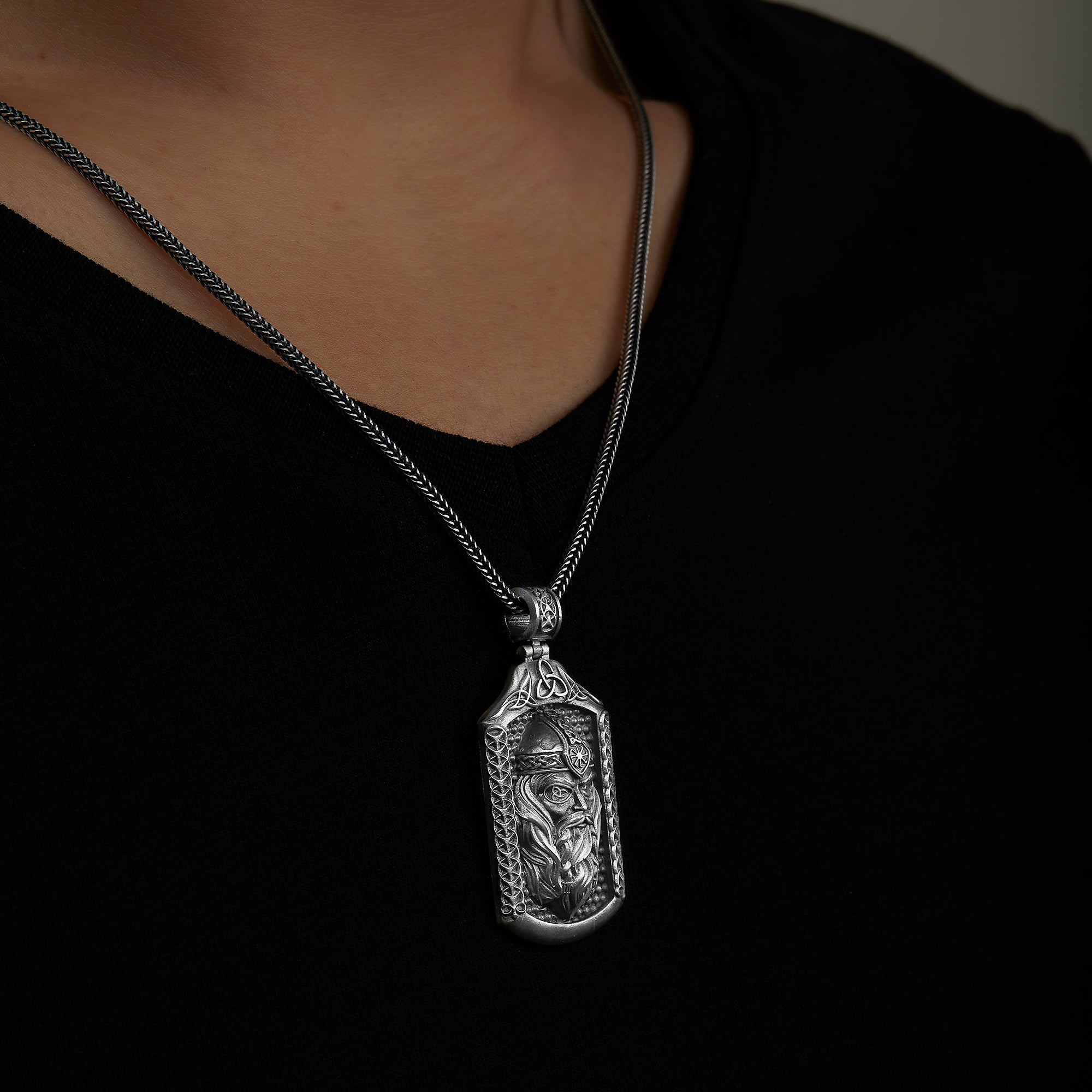 handmade sterling silver Odin Head Necklace on the neck preview