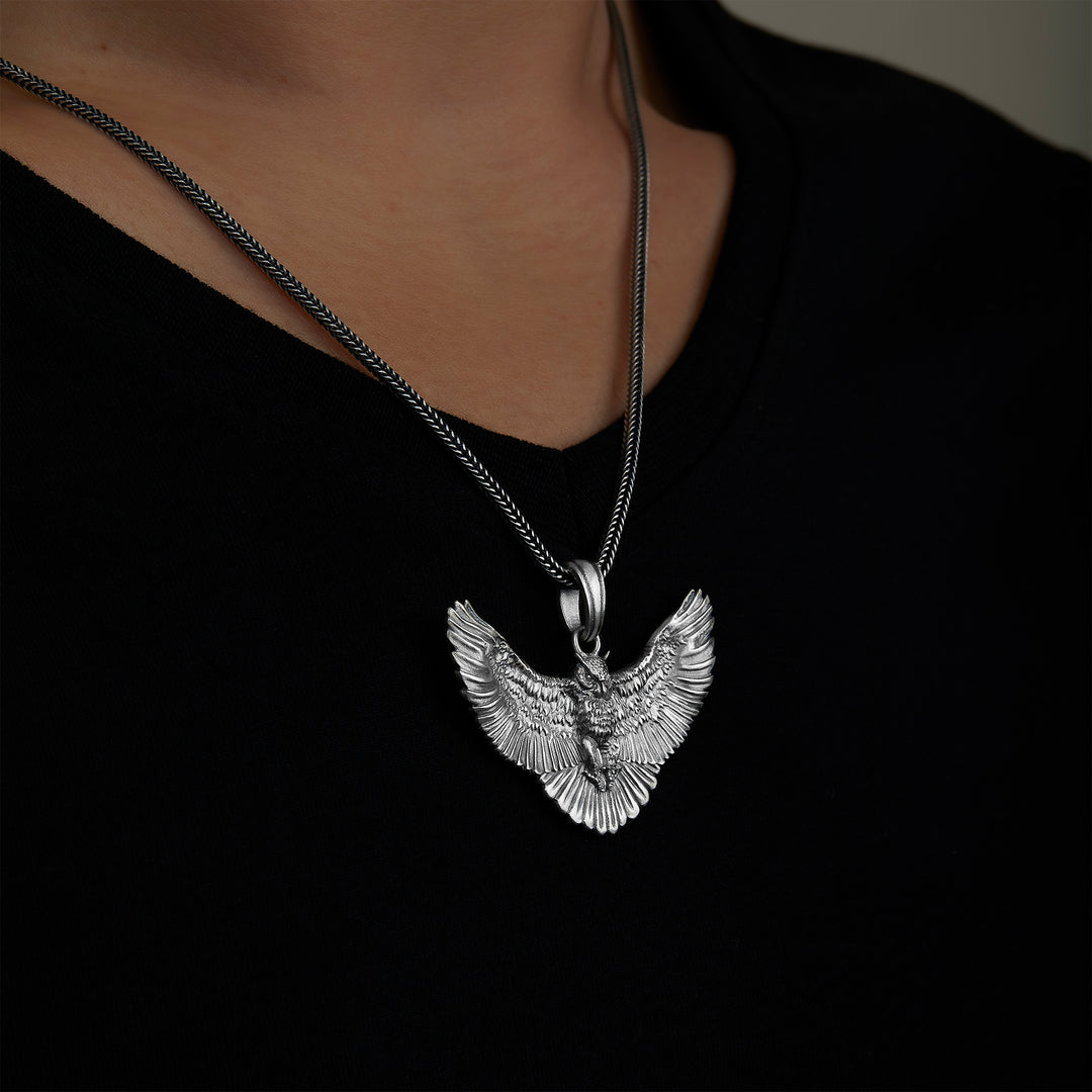 sterling silver Owl And Wings Necklace on the neck preview