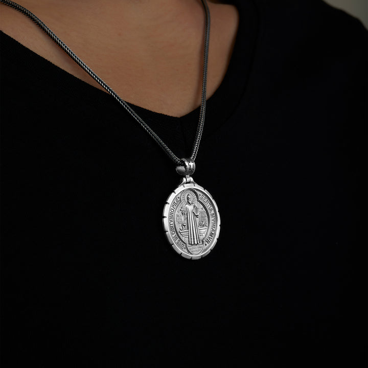 handmade sterling silver Saint Benedict Necklace on the neck preview