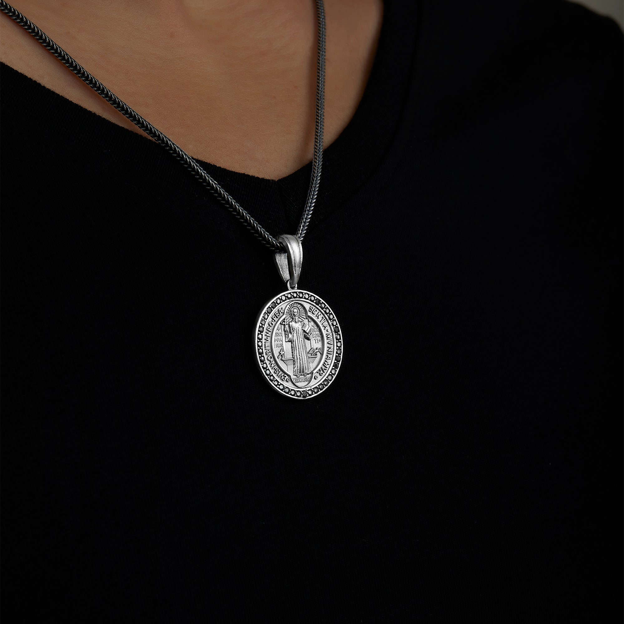 handmade sterling silver Saint Benedict Necklace on the neck preview