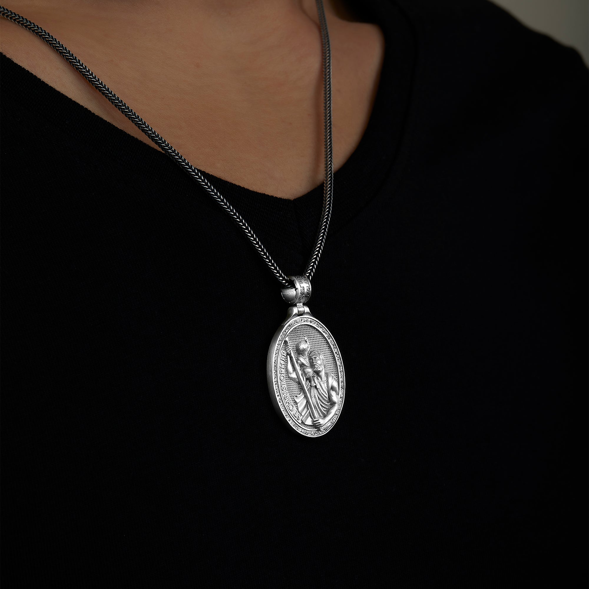 handmade sterling silver Saint Christopher Necklace on the neck preview