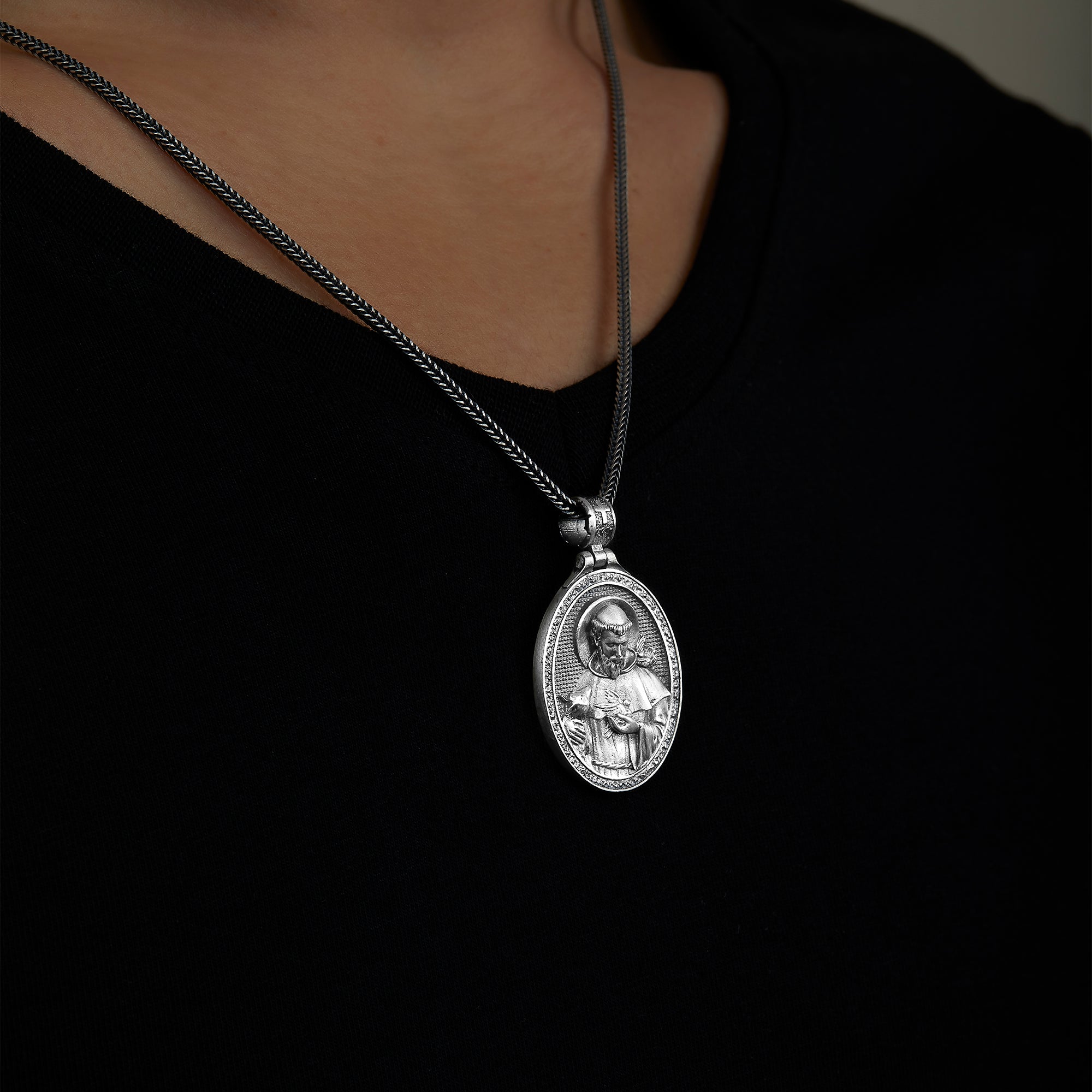 handmade sterling silver Saint Francis Necklace on the neck preview