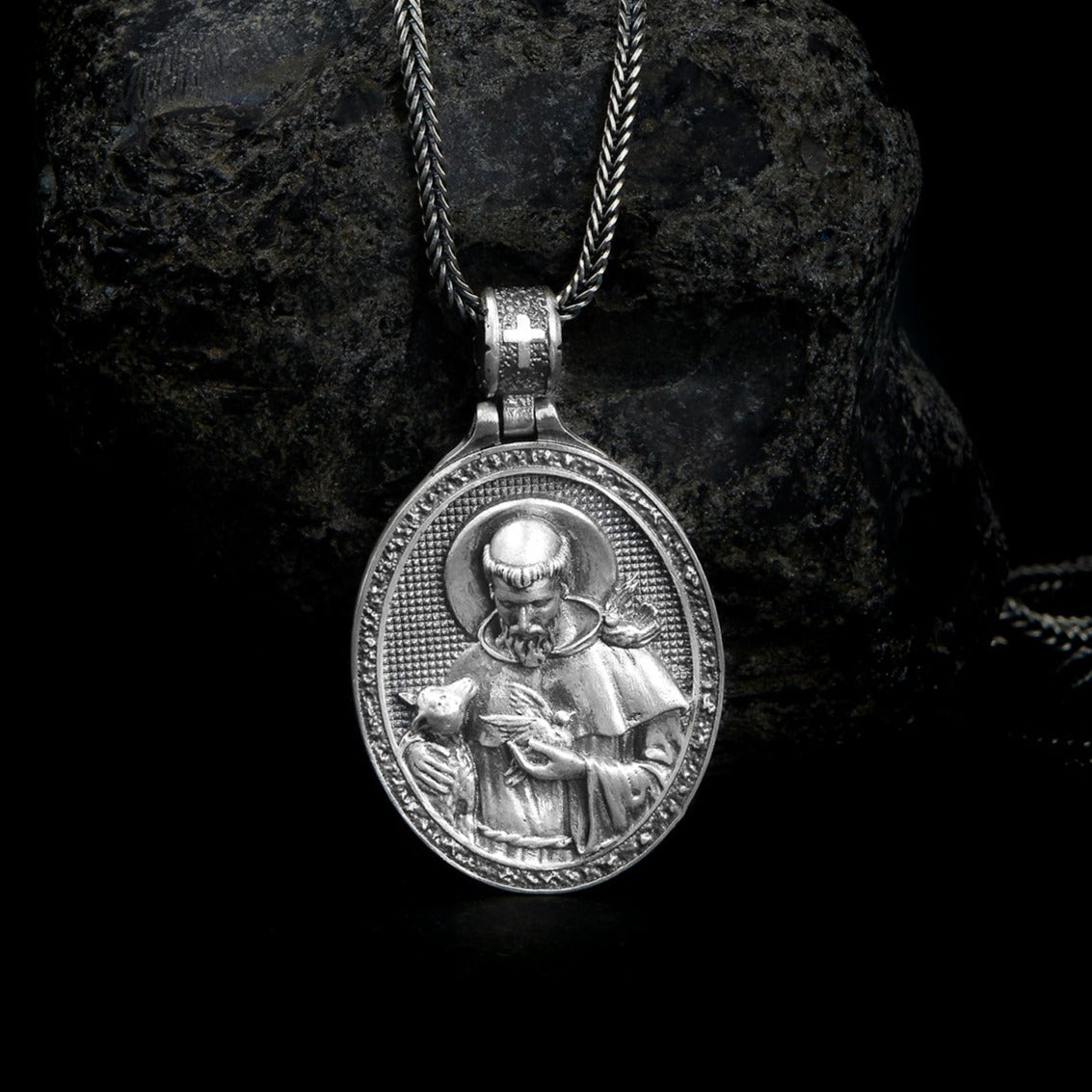 sterling silver Saint Francis Necklace, synonymous with benevolence and divine love, faith, christianity.