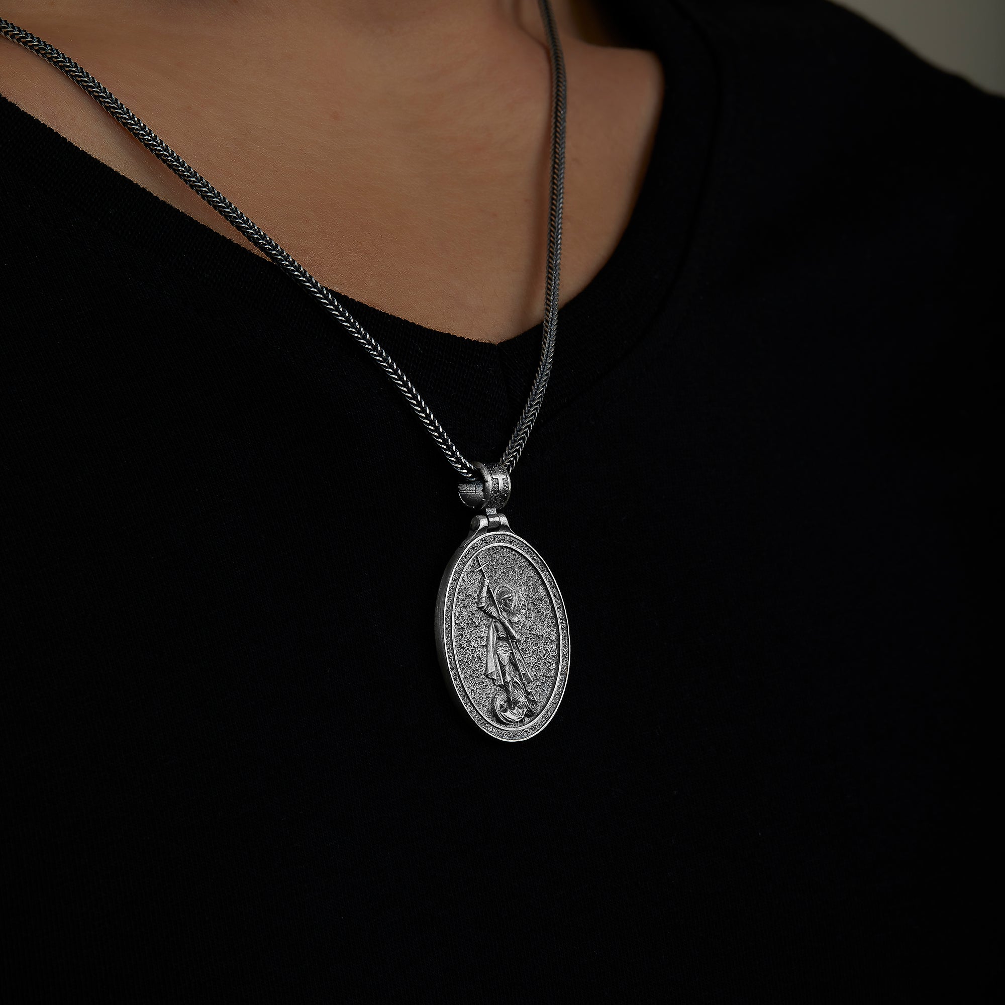handmade sterling silver Saint George Dragon Necklace on the neck preview