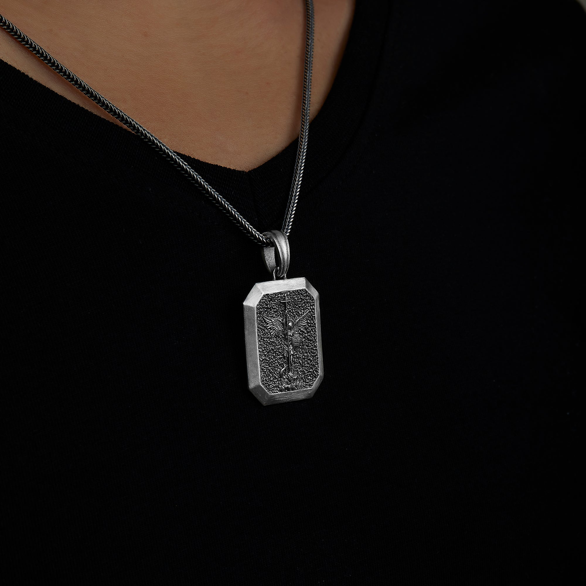 handmade sterling silver Saint Michael Shield Necklace on the neck preview