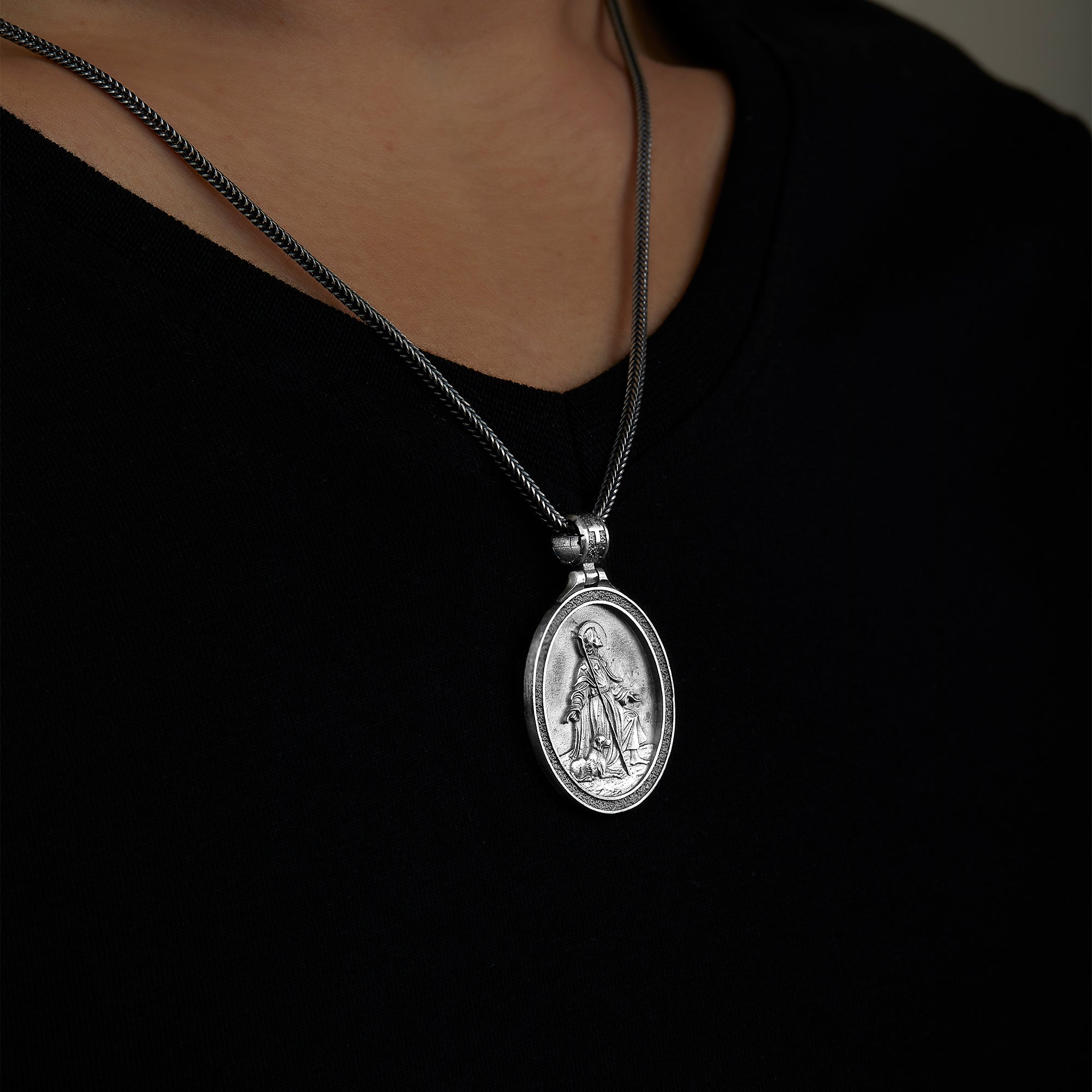 handmade sterling silver Saint Roch Necklace on the neck preview
