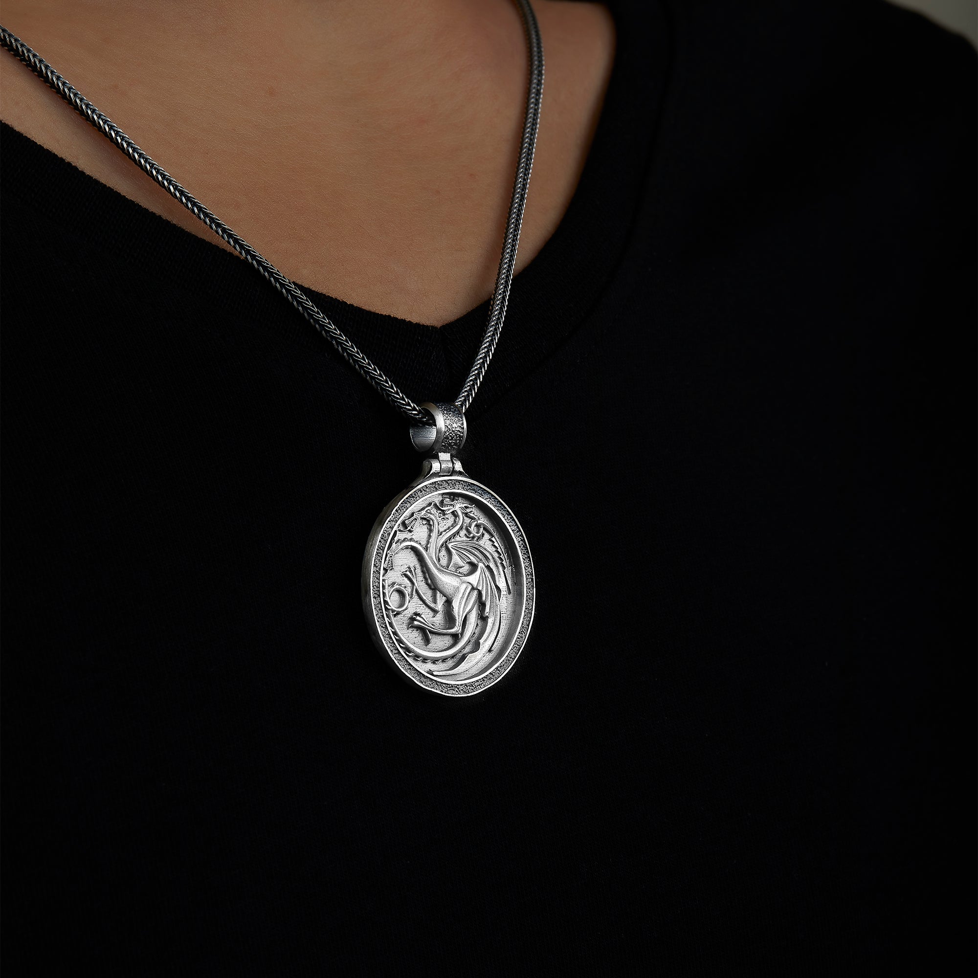 handmade sterling silver Targaryen Dragons Necklace on the neck preview