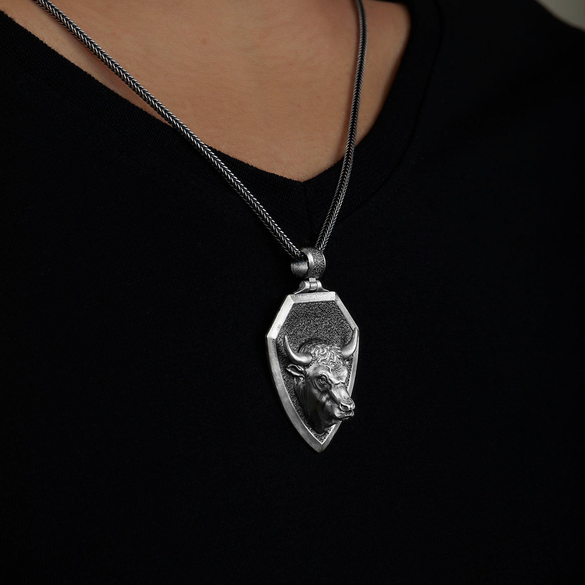handmade sterling silver Taurus Bull Head Necklace on the neck preview