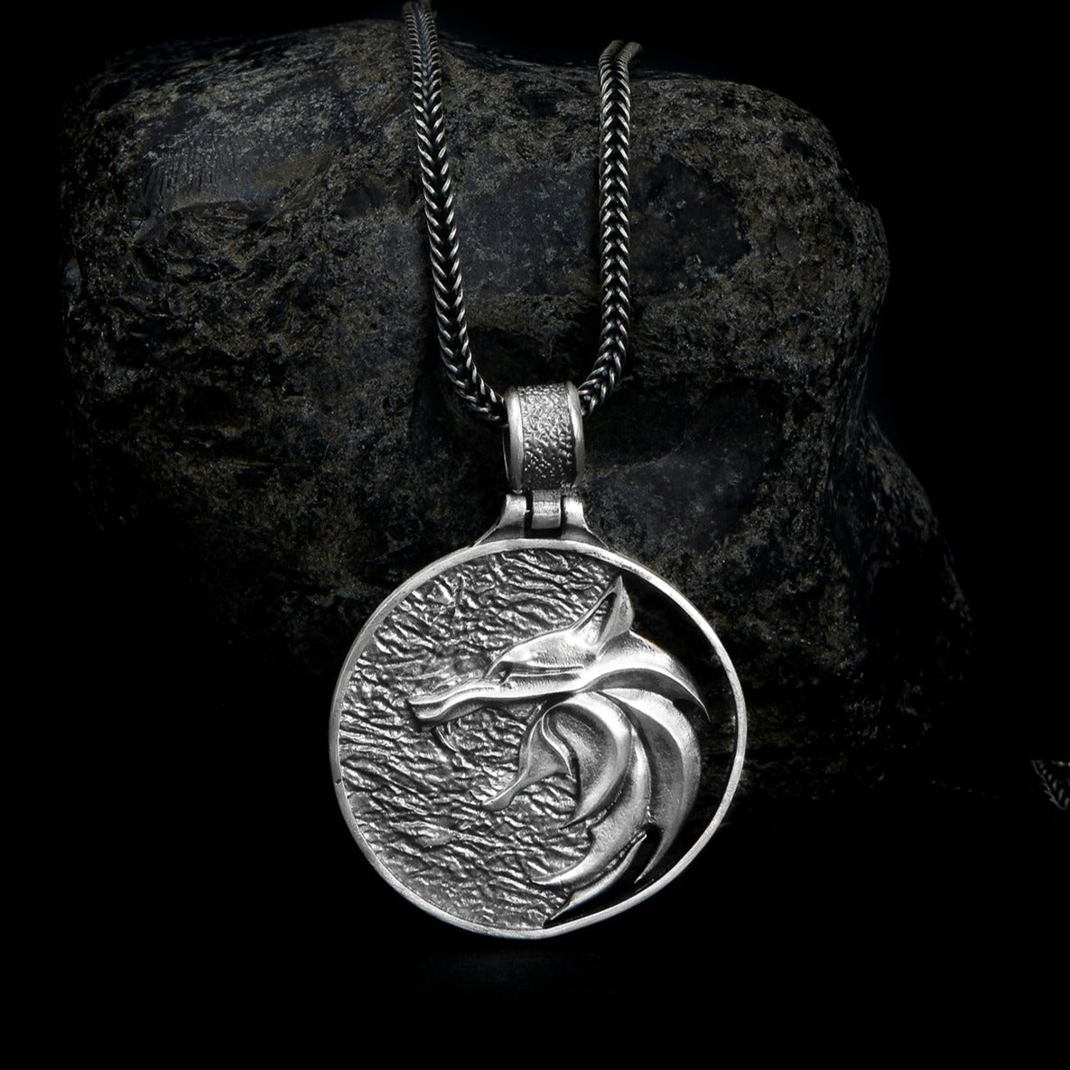 Handcrafted sterling silver Witcher Wolf Necklace, capturing the intricate design of the iconic wolf emblem from the Witcher series.