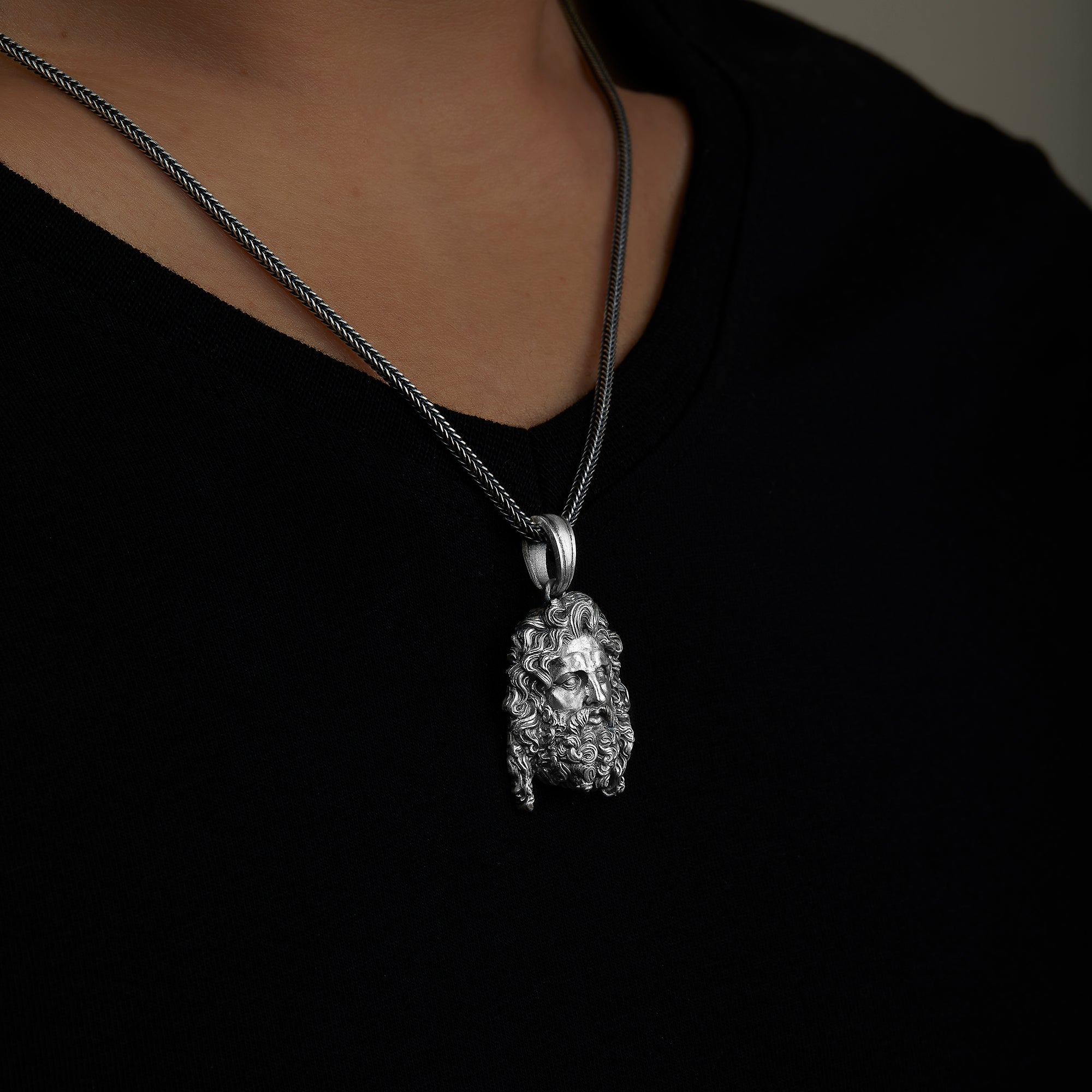 handmade sterling silver Zeus Head Necklace on the hand preview